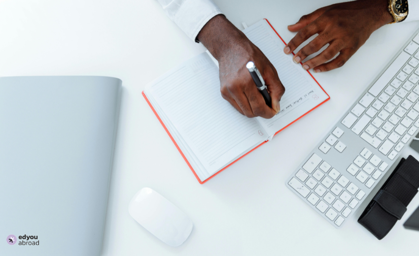 Top Universities to study Supply Chain Management in the USA 2025 Photo by Thirdman: https://www.pexels.com/photo/person-writing-on-white-paper-beside-apple-magic-mouse-5060557/